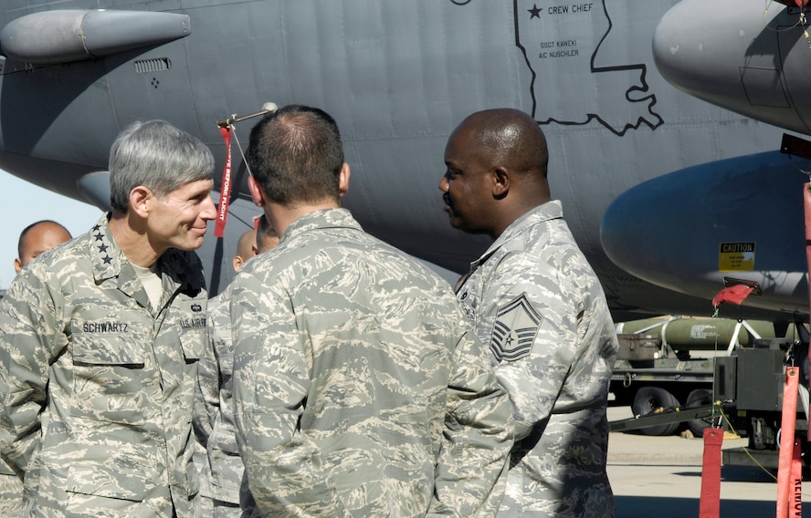 Chief of Staff of the Air Force Gen. Norton Schwartz familiarizes himself about the 2nd Aircraft Maintenance Squadron's mission Nov. 25 at Barksdale Air Force Base, La. (U.S. Air Force photo/Senior Airman Alexandra Sandoval)