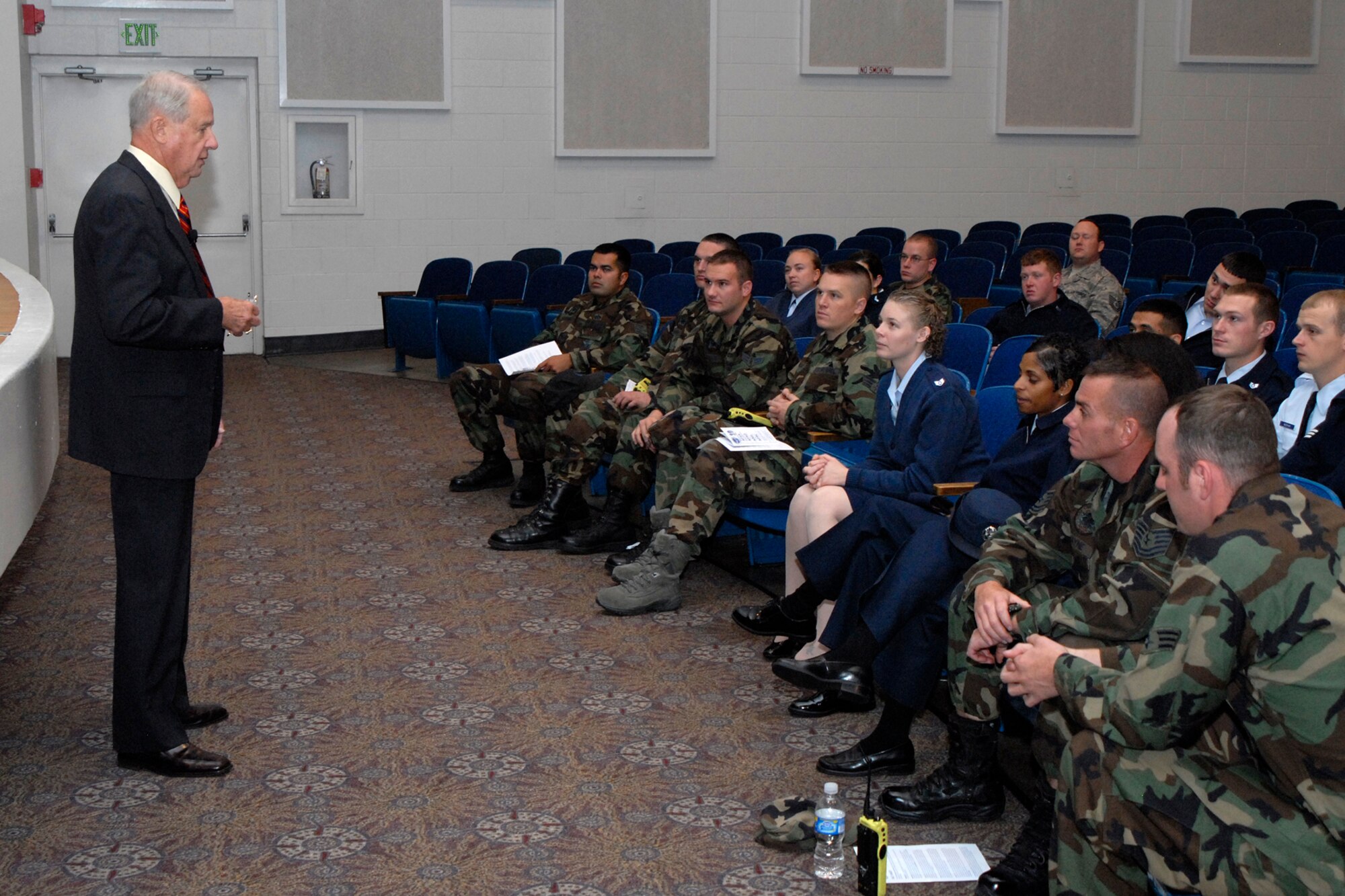 Chief Master Sgt. (Ret.) John "Doc" McCauslin, International Air Force Sergeants Association president, briefs Peterson Air Force Base enlisted personnel on the benefits of his professional organization Nov. 10 at the base auditorium. Airmen are encouraged to participate in professional organizations as a way to develop their careers and increase leadership ability. (Air Force photo/Craig Denton)