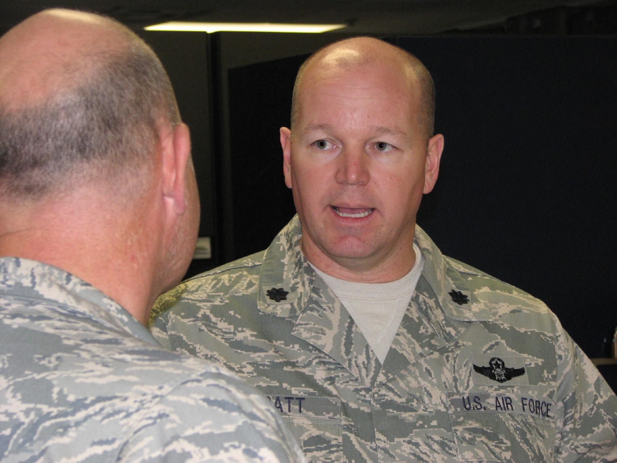 Lt. Col. Michael Pratt, 819th Global Support Squadron commander, speaks with Col. Mark Schmitz, AMC UCI team chief, during the 621st Contingency Response Wing's compliance inspection, Nov. 18-24. The UCI was the first-ever administered by the AMC IG to an Air Force CRW. (U.S. Air Force photo/1Lt Dustin Doyle)