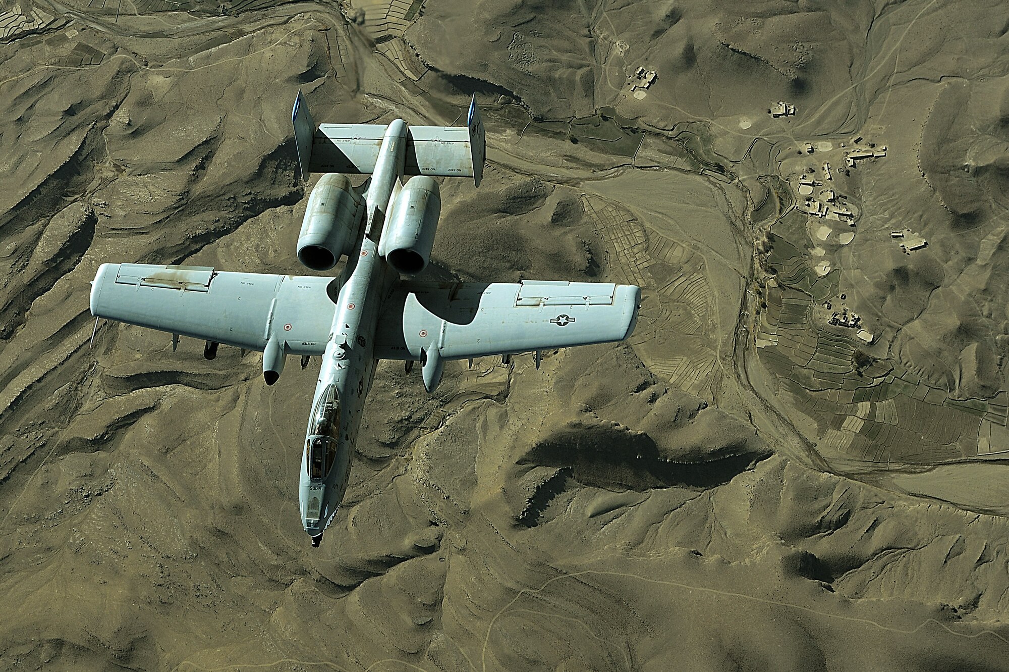 An Air Force A-10 Thunderbolt II flies a combat mission over Afghanistan in support of Operations Enduring Freedom. A-10s provide close-air support and perform sorties daily providing top cover for ground forces in Southwest Asia. (U.S. Air Force photo/Staff Sgt. Aaron Allmon)  
