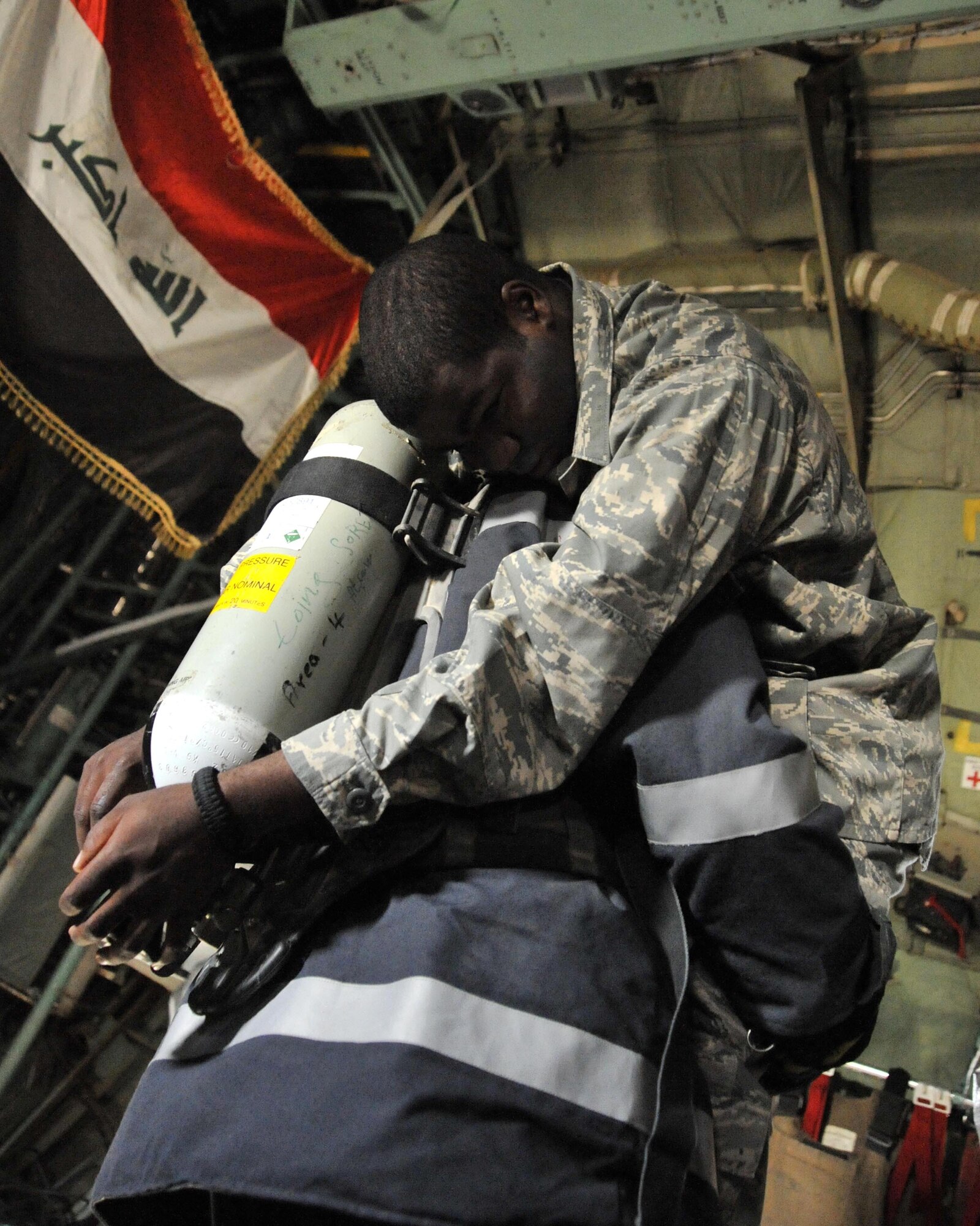11/21/2008 ? NEW AL MUTHANA AIR BASE, Iraq -  An Iraqi ar force firefighter rescues a U.S. Airman mock casualty during a major accident response exercise at New al Muthana Air Base, Iraq on Nov. 21, 2008. The MARE tests the abilities of a joint response of fire rescue, medical and security capabilities. (U.S. Air Force photo by Master Sgt. Brian Davidson) 