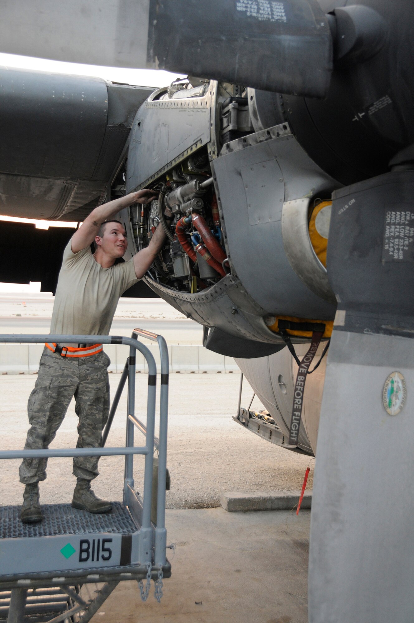 Senior Airman Marcus Lake, hydraulics journeyman assigned to the 379th Expeditionary Aircraft Maintenance Squadron, inspects the engine of a C-130 H1 as part of a combo inspection Nov. 25, 2008, at an undisclosed air base in Southwest Asia. The combo inspection is when both the crew chief members and hydraulics members inspect the plane at the same time to ensure it's ready to fly and support the Global War on Terror. Airman Lake, a native of Detroit, Mich., is deployed from Yokota Air Base, Japan, in support of Operations Iraqi and Enduring Freedom and Joint Task Force-Horn of Africa. (U.S. Air Force photo by Staff Sgt. Darnell T. Cannady/Released)