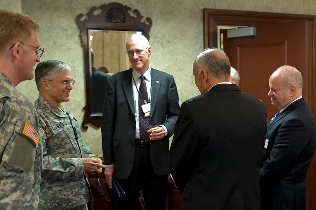 Left to right, Army Lt. Gen. (Dr.) Eric Schoomaker, Army surgeon general; Gen. George W. Casey Jr., Army chief of staff; Dr. Michael Matthews, U.S. Military Academy professor; Dr. Richard Cormona, former U.S. surgeon general; and Dr. Martin Seligman, former president of the American Psychological Association, talk before having a roundtable discussion at the Pentagon about improving warrior care and health literacy within the Army, Nov. 25, 2008. U.S. Army photo by D. Myles Cullen