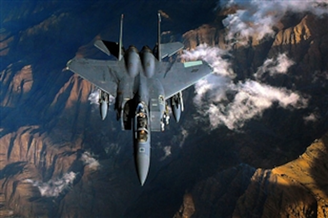 An F-15E Strike Eagle jet flies over Afghanistan providing overwatch for ground operations, Nov. 13, 2008 The Strike Eagle is assigned to the 391st Expeditionary Fighter Squadron, Bagram Airfield, Afghanistan.