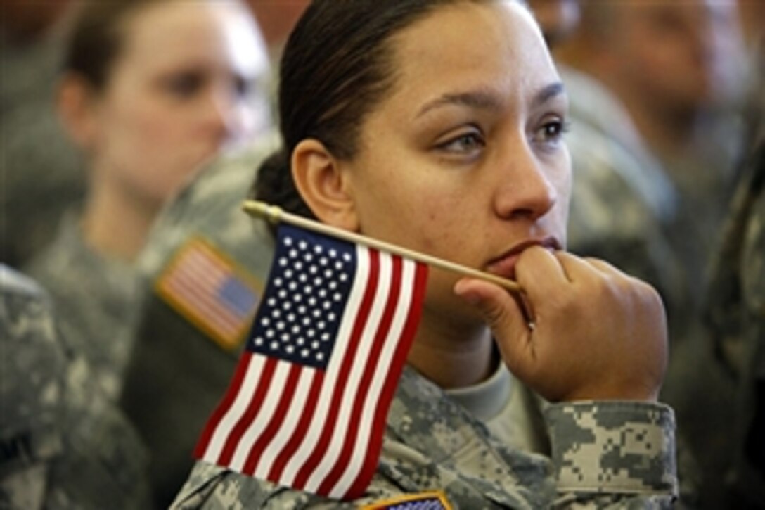 A U.S. Army soldier listens to remarks by President George W. Bush on Fort Campbell, Ky., Nov. 25, 2008. Fort Campbell is one of the Army's premier training and deployment installations.