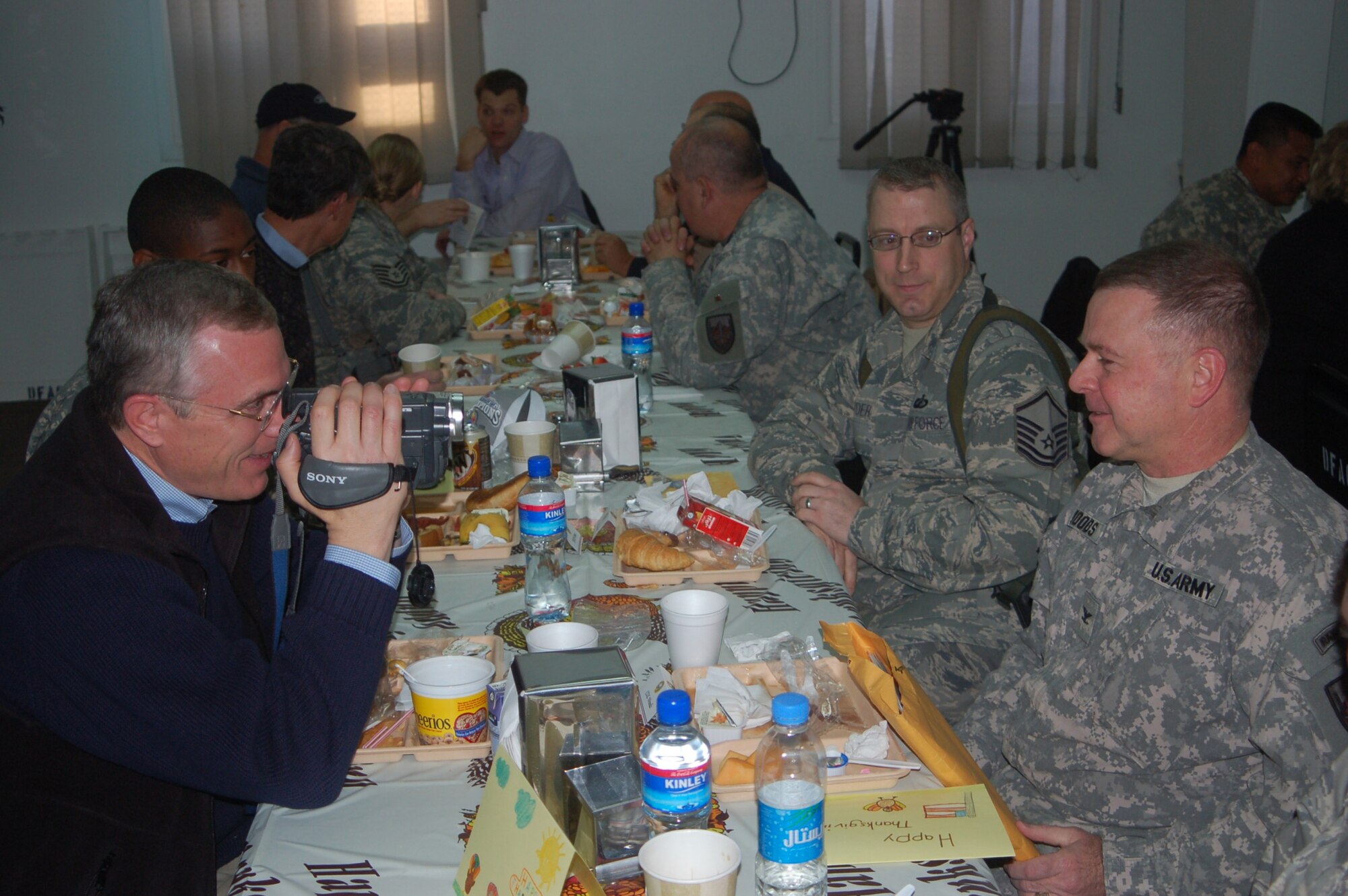 Rep. Tim Murphy, R-Pa., videotapes Army Col. George Woods for a message back to his home state of Pennsylvania during a visit to Camp Eggers on Thanksgiving Day. Murphy was one of six U.S. congressmen to visit Combined Security Transition Command-Afghanistan to talk to servicemembers from their respective states.
