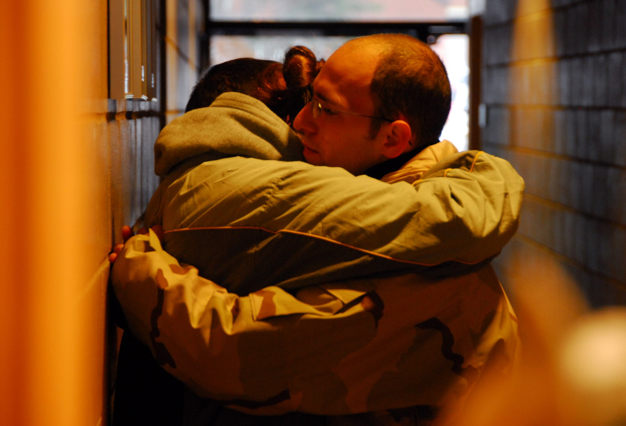 A guardsman says goodbye to his girlfriend as he and approximately 125 members of the 148th Fighter Wing, Duluth Minn. deploy to Joint Base Balad, Iraq on November 27, 2008 as a part of its Air Expeditionary Force (AEF) deployment. (U.S. Air Force photo by TSgt Jason W. Rolfe) (Released)