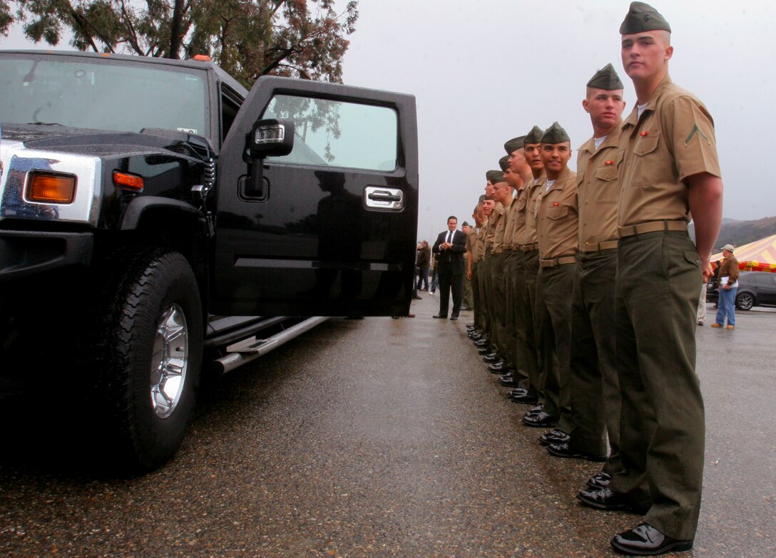 Students from School of Infantry West line up, ready to depart and enjoy a home cooked Thanksgiving dinner at the home of local community families during the Armed Services Young Men's Christian Association Home Hospitality event, Thanksgiving day 2008. That year the ASYMCA served more than 48,000 service members and their families with various holiday events.