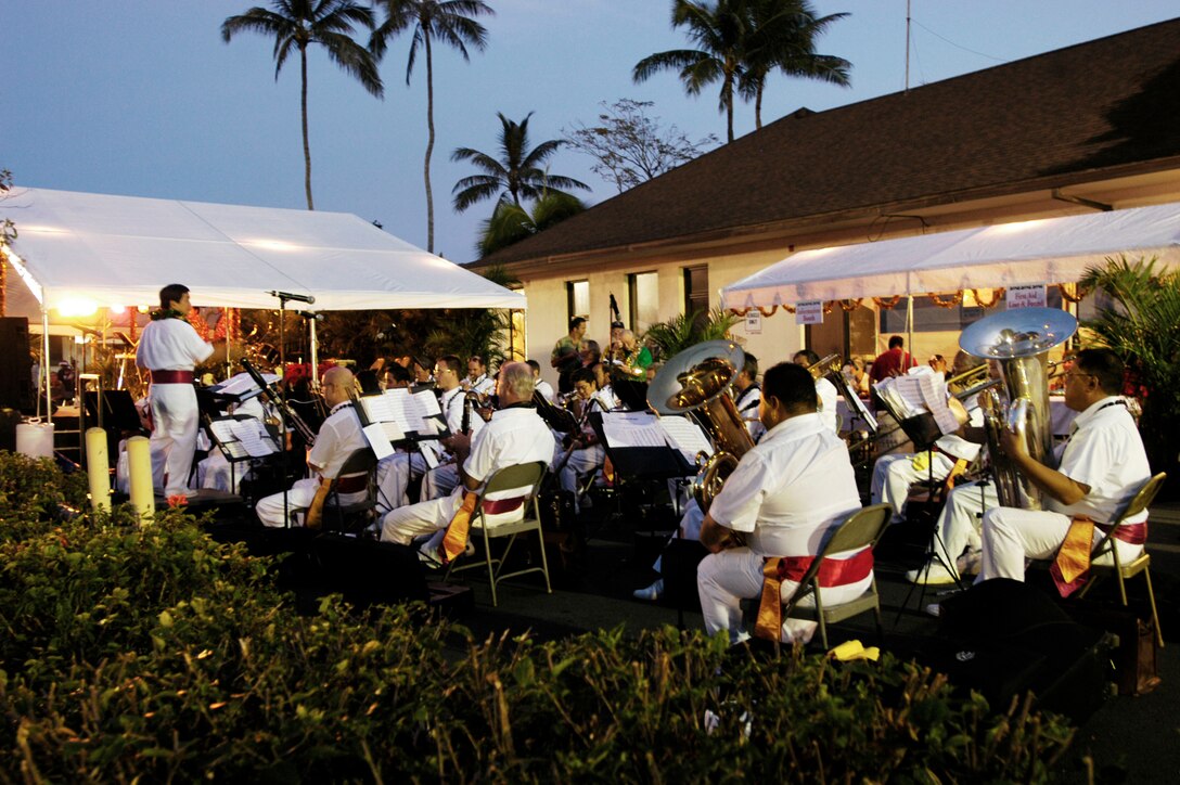 The Royal Hawaiian Band performs a holiday medley during the city of Kaneohe's 3rd Annual Windward City Lights celebration Nov. 30. The event featured rides and games for children, foot and craft booths and the official lighting of the city's holiday lights by Honolulu Mayor Mufi Hannemann.