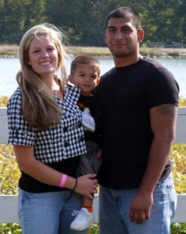 Sgts. Kara and Victor Perez enjoy a day at a fall festival in Kansas City with their son Roman in October, 2008.
