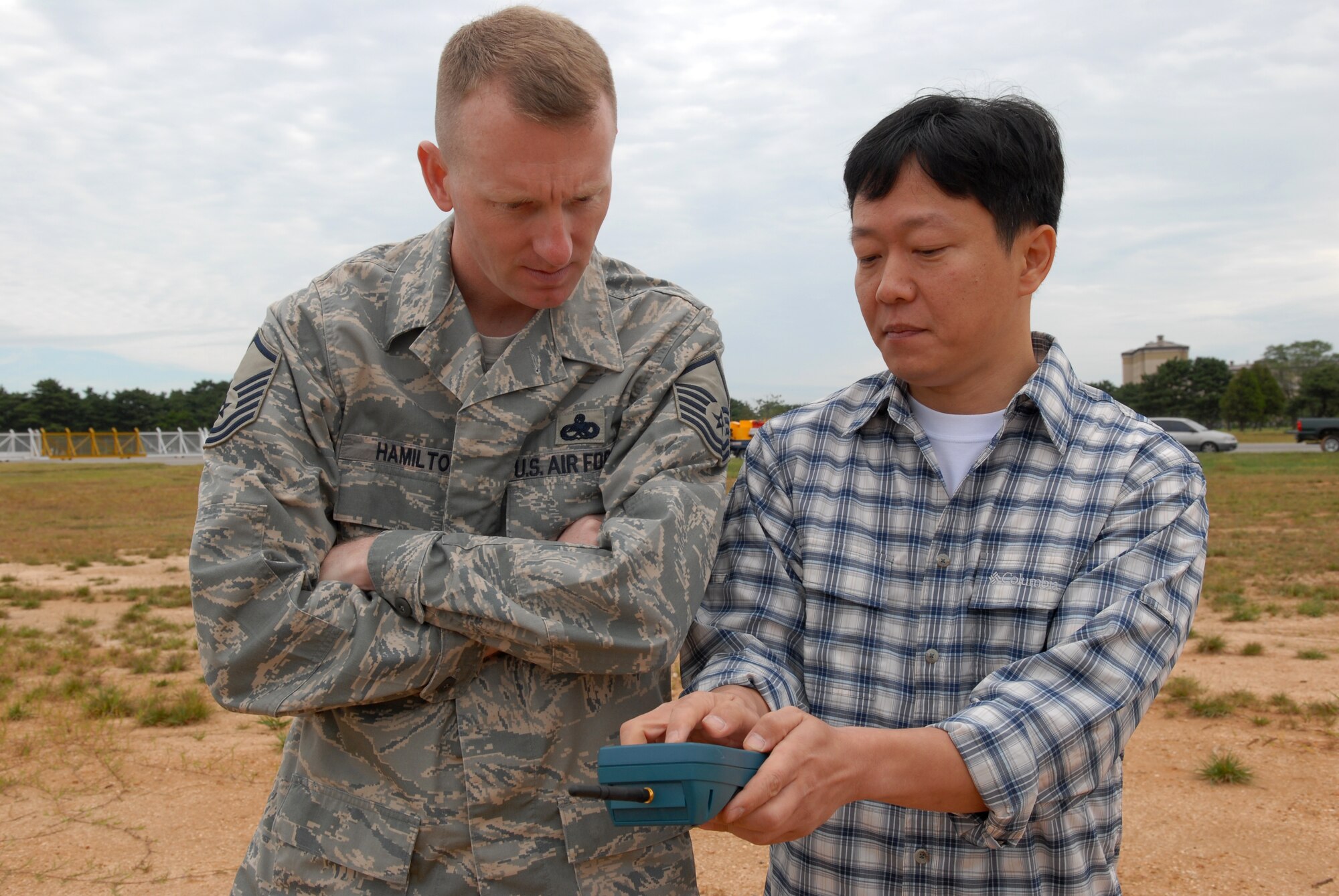 KUNSAN AIR BASE, Republic Of Korea -- Master Sgt.Guy Hamilton, 8th Fighter Wing Flight Safety NCOIC, receives training on new bird cannon systems that were installed here Sep. 29.  The bird cannons are being installed as part of the Bird Wildlife Aircraft Strike Hazard program, which aims to keep the flight line and the variety of aircraft safe from bird hazards.The base shares it's flight line with the Republic of Korea Air Forces' 38th Fighter Group and Korean Airlines.(U.S. Air Force photo by: Senior Airman Angela Ruiz)