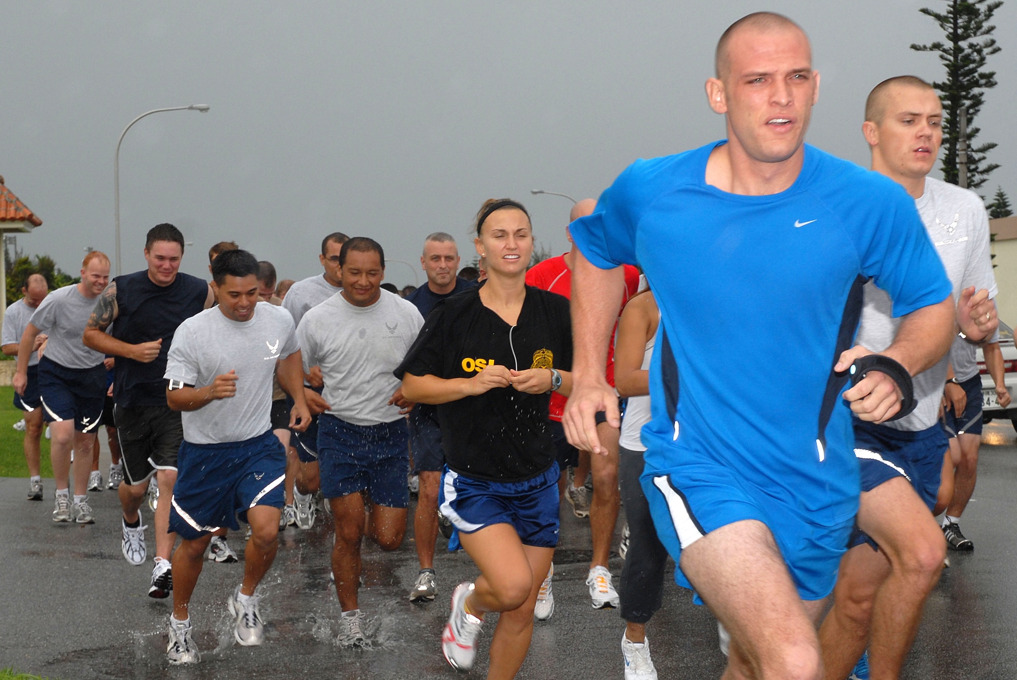 Participants in the 5K Fun Run for the Combined Federal Campaign take off from the starting line at the Risner Fitness Center at Kadena Air Base, Oct. 1, 2008.  (U.S. Air Force photo by Staff Sgt. Chrissy Best)