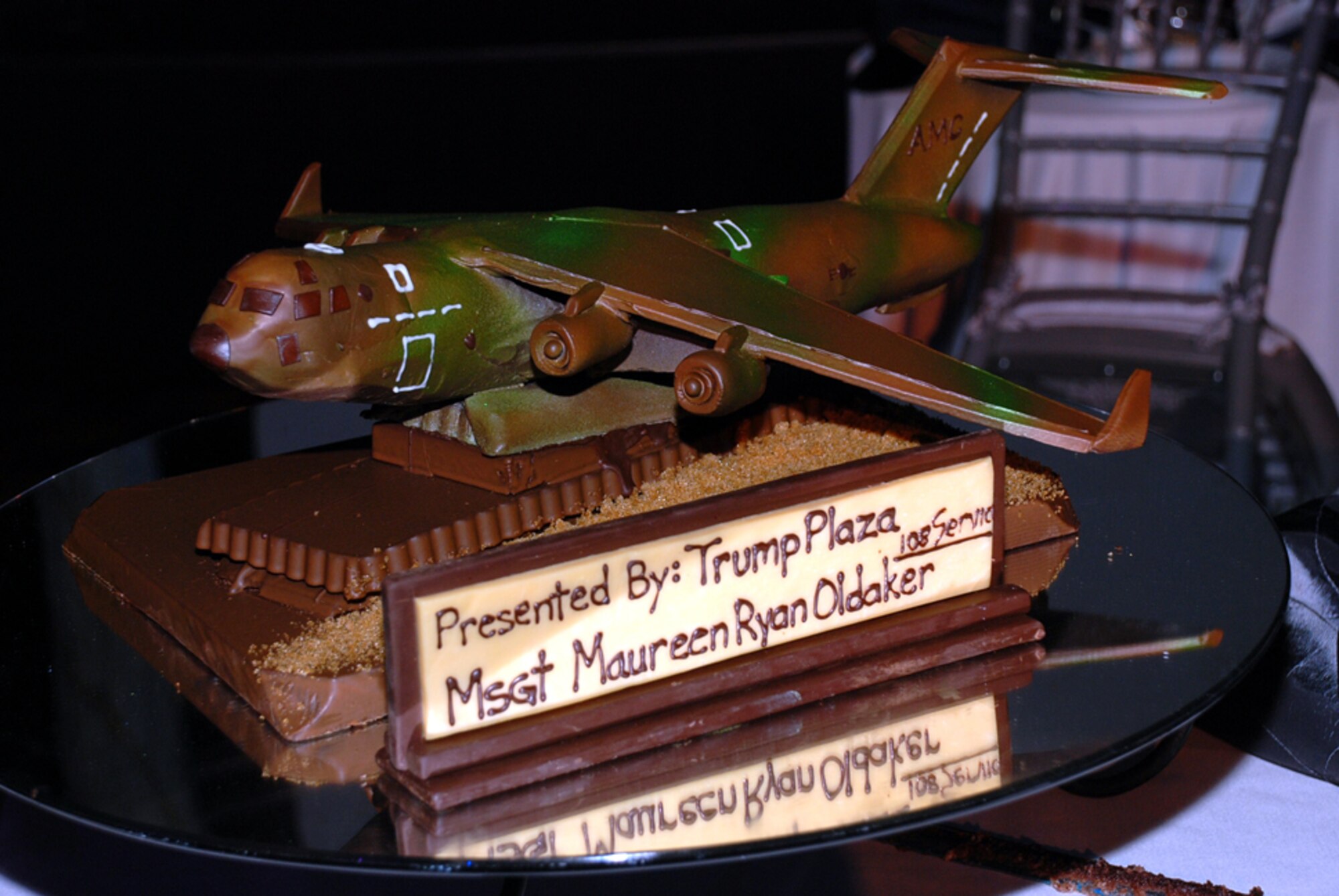 A C-17 made entirely out of chocolate was presented during the cake ceremony at McGuire’s Air Force Ball Sept. 26 in Atlantic City, N.J. Dinner guests also enjoyed miniature chocolate airplanes for dessert. (U.S. Air Force photo/Capt. Darrick Lee)