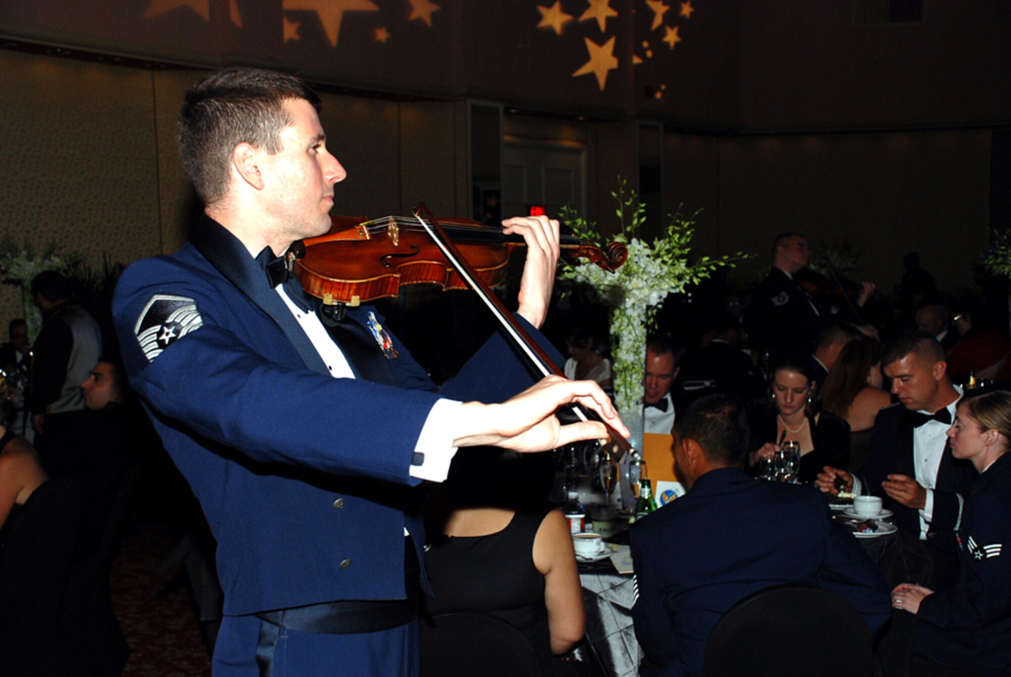A member from the U.S. Air Force Strolling Strings, one of the premier and most-requested ensembles in the United States Air Force, performs during McGuire’s Air Force Ball Sept. 26 in Atlantic City, N.J. The group was part of the evening’s entertainment that included live singers and a jazz band. (U.S. Air Force photo/Capt. Darrick Lee)