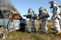 MINOT AIR FORCE BASE, N.D. -- Fire Fighters from the 5th Civil Engineer Squadron here complete their semi-annual automobile fire extinguishing training using a donated car, Oct. 1. (U.S. Air Force photo by Senior Airman Kelly Timney)