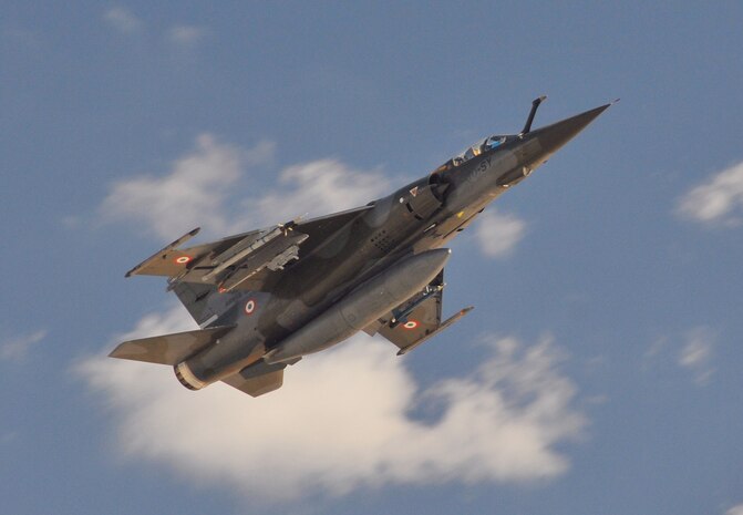NELLIS AIR FORCE BASE, Nev. -- A French Air Force Mirage F1 takes off for a Green Flag mission from Nellis AFB.  Green Flag exercises provide realistic close air support training for Air Force, sister services, and international fighter, bomber, and airborne command and control units.  The exercises, which focus on air support for high desert armored warfare, facilitate joint operational training at the US Army National Training Center, Fort Irwin, Calif.  Green Flag also trains Air Force and coalition ground combat units in the tactical control of airpower in the close battle.  (U.S. Air Force photo by Chief Master Sgt. Gary Emery)
