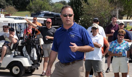 Chief Master Sgt. Stephen Page, 12th Flying Training Wing command chief master sergeant, addresses the crowd at his farewell golf tournament Oct. 1 at Randolph Oaks Golf Course. This chief retires Oct. 3. (U.S. Air Force photo by Rich McFadden)