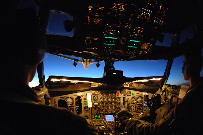 A KC-10 Extender assigned to the 60th Air Mobility Wing, Travis Air Force Base, Calif., prepares to refuel an E-8C Joint Surveillance Target Attack Radar System from the 116th Air Control Wing, Robins AFB, Ga., during a flying mission in support of Green Flag West on Sept. 25, 2008. The JSTARS provides long-range, air-to-ground surveillance designed to locate, classify and track ground targets for the Army and Marine Corps. (U.S. Air Force Photo/Senior Airman Larry E. Reid Jr.)