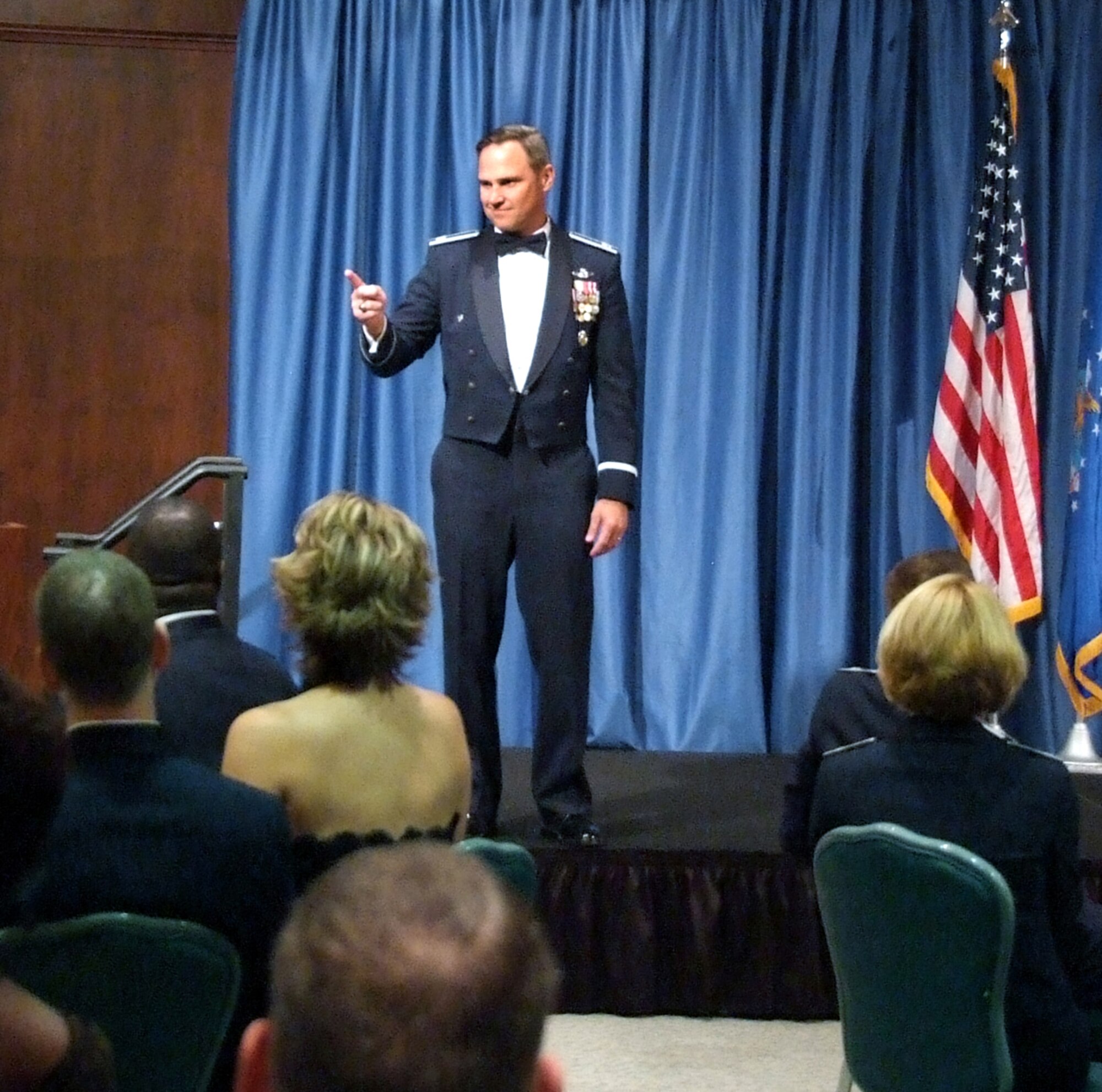 Col. Mark Nowland, 71st Flying Training Wing commander, stresses the importance of leading from the front to the eight Team Vance members inducted into the senior NCO ranks during a ceremony held Sept. 24 in the Vance Collocated Club. Eighty-eight family members, supervisors, commanders and the 13th Chief Master Sergeant of the Air Force, Jim Finch, attended. (U.S. Air Force photo by Terry Wasson)