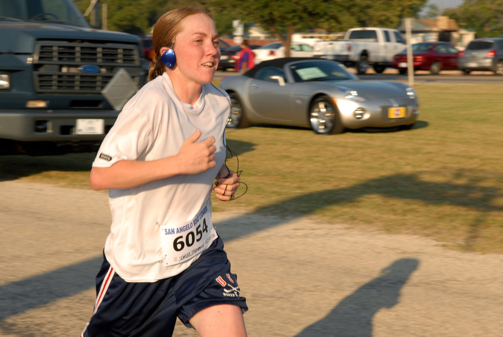 Army Staff Sgt. Stephanie Slater, 344th Military Intelligence Batallion Bravo Company drill sergeant, crosses the finish line as the top female finisher for the 10-kilometer race portion of the 2008 ArmyDillo Run at Mary E. Lee Park in San Angelo, Texas, Sept. 27.  More than 350 people participated in the annual event, which benefits the Sentinel Foundation and consists of a 10-kilometer race, a two-mile individual race, a two-mile team race, and a two-mile military formation race.  Sergeant Slater won the 10-kilometer race with a time of 49:20:06. (U.S. Air Force photo by Senior Airman Kasabyan Musal)