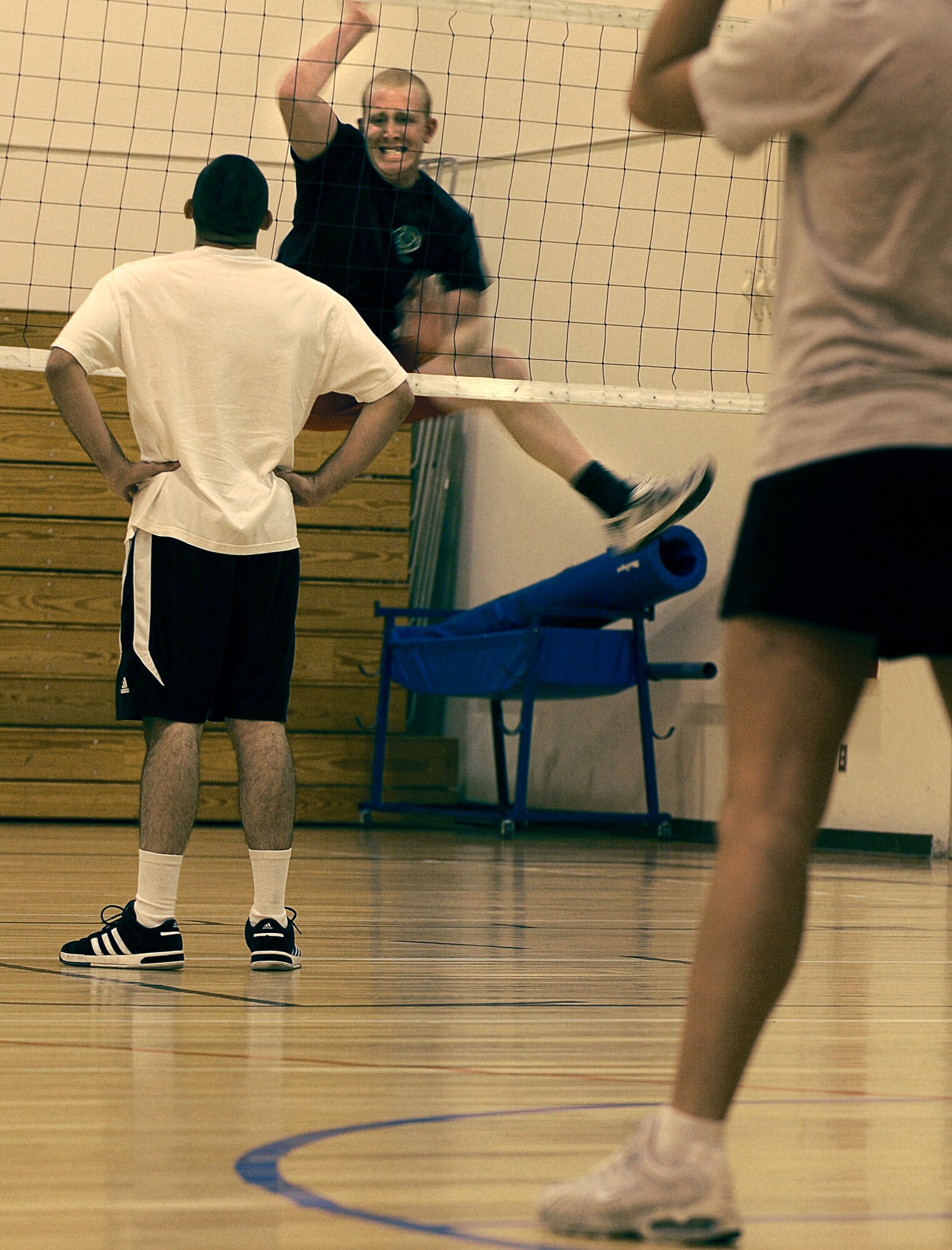 MOUNTAIN HOME AIR FORCE BASE, Idaho--Airman 1st Class Scott O'Connell, 366th Civil Engineer Squadron fire fighter, celebrates after scoring a point during a volleyball match Sept. 24 at the base fitness center.  The game was part of sports day, used to promote fitness, and included volleyball, wallyball, racquetball and dodgeball competitions. (U.S. Air Force photo/Airman 1st Stephany Miller)