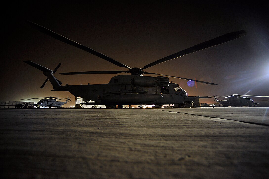 MH-53 Pave Lows from the 20th Expeditionary Special Operations Squadron sit on the tarmac prior to the last combat mission of the helicopters Sept. 27 in Iraq. The MH-53 is retiring after nearly 40 years of service to the Air Force. (U.S. Air Force photo/Staff Sgt. Aaron Allmon) 