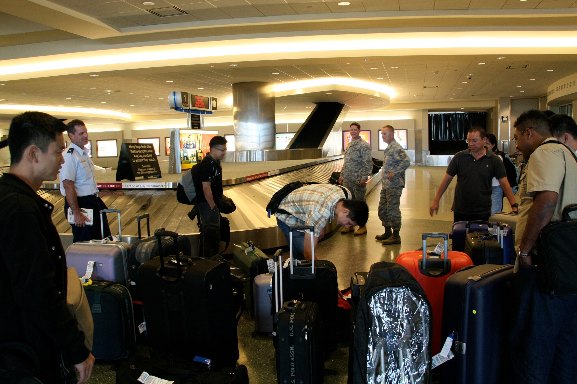 MOUNTAIN HOME AIR FORCE BASE, Idaho -- Members of the Republic of Singapore air force and their families arrive in Boise, Idaho, Sept. 22 before heading to Mountain Home Air Force Base. This first set of RSAF personnel will be responsible for general set up operations with the first F-15SG aircraft scheduled to arrive in May 2009. The RSAF will train with the 389th and 391st Fighter Squadrons for the next five to 20 years and will bring 10 F-15SG aircraft along with approximately 179 RSAF active duty personnel and 128 support personnel with their families. (Courtesy photo)