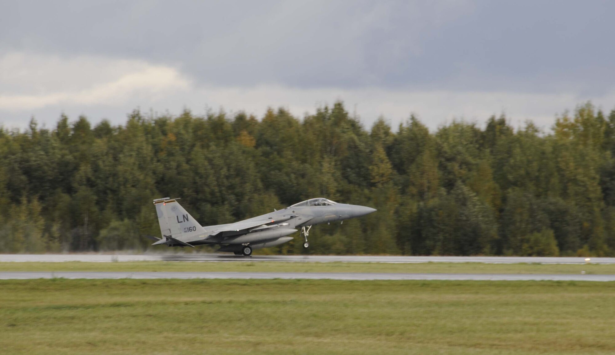 An F-15 deployed from RAF Lakenheath lands in Siauliai, Lithuania in preparation for the U.S. Air Forces in Europe to assume the NATO Baltic air policing mission. The 493d Fighter Squadron deployed four F-15s. (U.S. Air Force photo by Tech. Sgt. J. LaVoie)