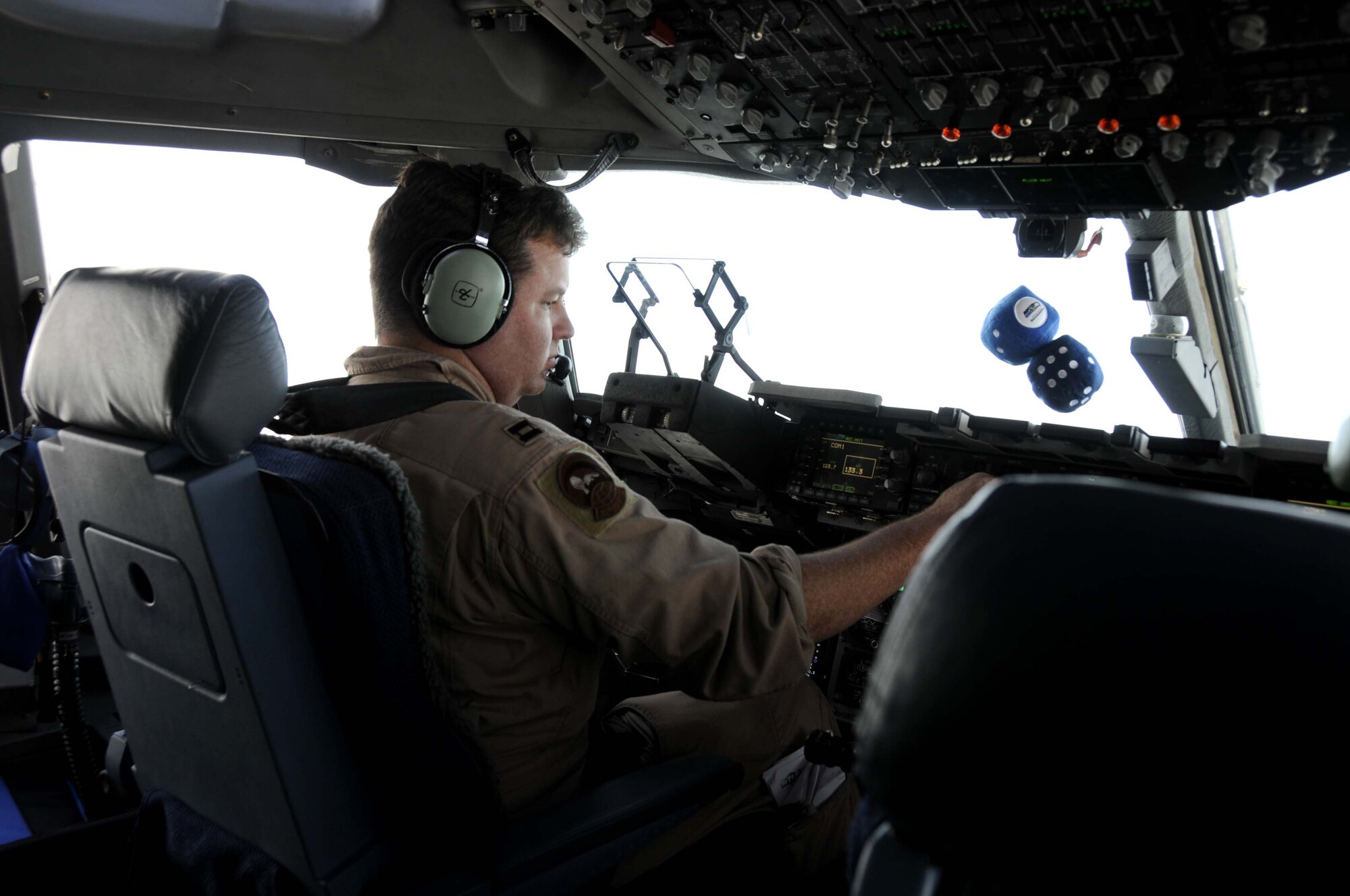 Pilot Capt Dan O’Keefe lands a McChord AFB-based C-17 in Lithuania, delivering supplies and personnel for the NATO Baltic air policing mission.  The 493d Fighter Squadron deployed four F-15s and about 130 Airmen to the region. (U.S. Air Force photo by Tech. Sgt. J. LaVoie)