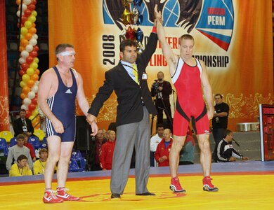 Steve Horton, a master sergeant with the 12th Flying Training Wing Public Affairs office, earns the bronze medal after defeating Sergey Pichalev during the 2008 World Veteran Wrestling Championship in Perm, Russia on Sept. 26.(Courtesy photo)