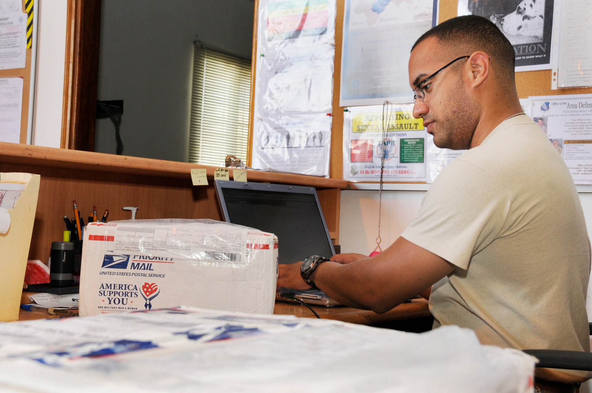 Staff Sgt. Eduardo Hurtado, 379th Expeditionary Communications Squadron, enters a United States Postal Service code to manually track accountable mail passing through the system Sept. 30, 2008.  A night crew delivers the next day?s mail to the Air Mail Terminal, where the day shift sorts it and places it into bins for each squadron at this undisclosed air base in Southwest Asia.  Sergeant Hurtado, a native of Somerville, Mass., is deployed from Westover Air Reserve Base, Mass., in support of Operations Iraqi and Enduring Freedom and Joint Task Force-Horn of Africa.  (U.S. Air Force photo by Tech. Sgt. Michael Boquette/Released)