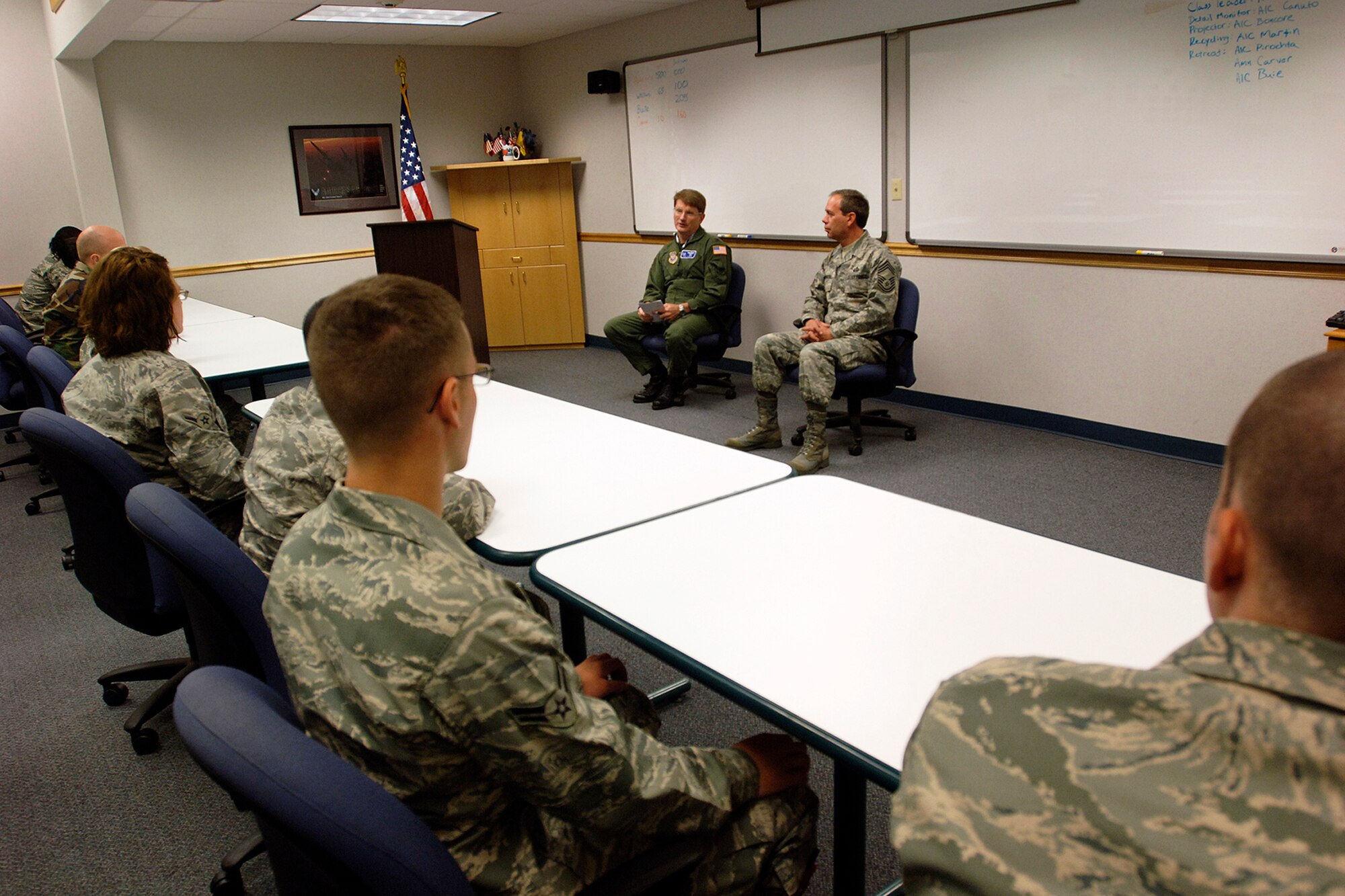 FAIRCHILD AIR FORCE BASE, Wash. – Col. Robert Thomas, 92nd Air Refueling Wing commander, and Chief Master Sgt. Donald Schroeder, 92nd Mission Support Squadron, address Airmen at the First Term Airmen Center Sept. 26. The Airmen were briefed on how important they are to Fairchild’s mission and were given the opportunity to ask questions. (U.S Air Force photo / Airman 1st Class Melissa Barnett)