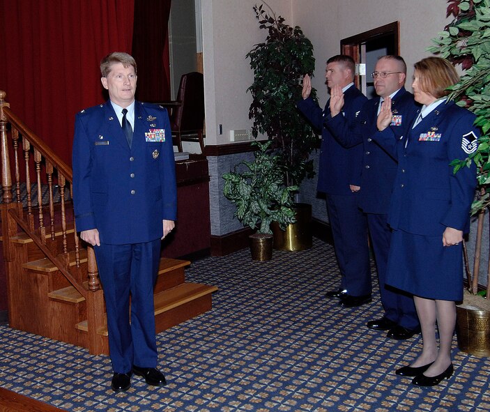 FAIRCHILD AIR FORCE BASE, Wash. – Col. Robert Thomas, 92nd Air Refueling Wing commander, swears in promotees recognized at the Wing Promotion Ceremony Sept. 30 at Club Fairchild. (U.S. Air Force photo / Staff Sgt. JT May III) 