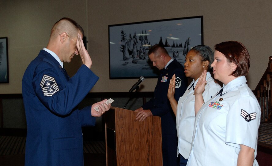 FAIRCHILD AIR FORCE BASE, Wash. – Chief Master Sgt. David Nordel, 92nd Air Refueling Wing command chief, leads newly promoted staff sergeants in the non-commissioned officer charge during the Wing Promotion Ceremony at Club Fairchild Sept. 30. (U.S. Air Force photo / Staff Sgt. JT May III)