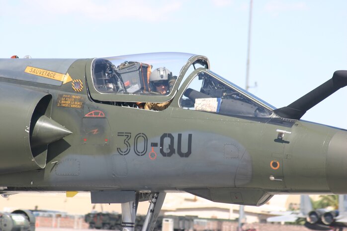 The French pilot of a Mirage F1 signals that he’s ready for take-off as part of the Green Flag West and NTC training rotations 08-10 at Nellis AFB, Nevada and Ft. Irwin, Calif.  (Photo by Casey Bain, JFIIT, USJFCOM)