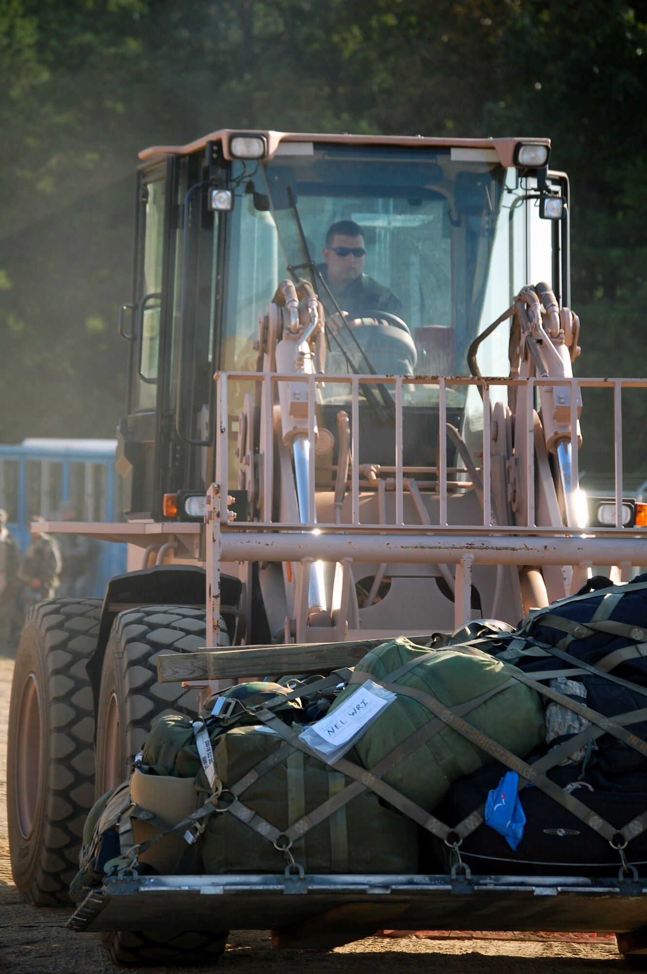 An Airman deployed to Air Force Exercise Eagle Flag 08-6 uses an extreme terrain forklift to move cargo during exercise operations at Naval Air Engineering Station Lakehurst, N.J., Sept. 23, 2008.  The exercise, managed by the U.S. Air Force Expeditionary Center's 421st Combat Training Squadron at Fort Dix, N.J., tests and trains Airmen in expeditionary combat support skills.  (U.S. Air Force Photo/Tech. Sgt. Scott T. Sturkol)