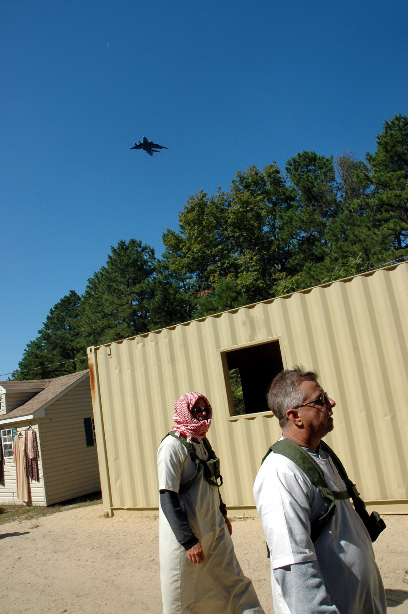 Role players for Air Force Exercise Eagle Flag 08-6 participate in a scenario during exercise operations at Naval Air Engineering Station Lakehurst, N.J., Sept. 23, 2008.  The exercise, managed by the U.S. Air Force Expeditionary Center's 421st Combat Training Squadron at Fort Dix, N.J., tests and trains Airmen in expeditionary combat support skills.  (U.S. Air Force Photo/Tech. Sgt. Scott T. Sturkol)