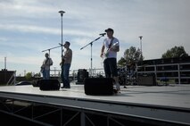 Airmen performed for Airmen at the ?Rock the Dorms? event Sept. 29.  The base Chapel's 2 p. m. contemporary Christian service praise and worship team gave of their time and were asked for numerous encores. 