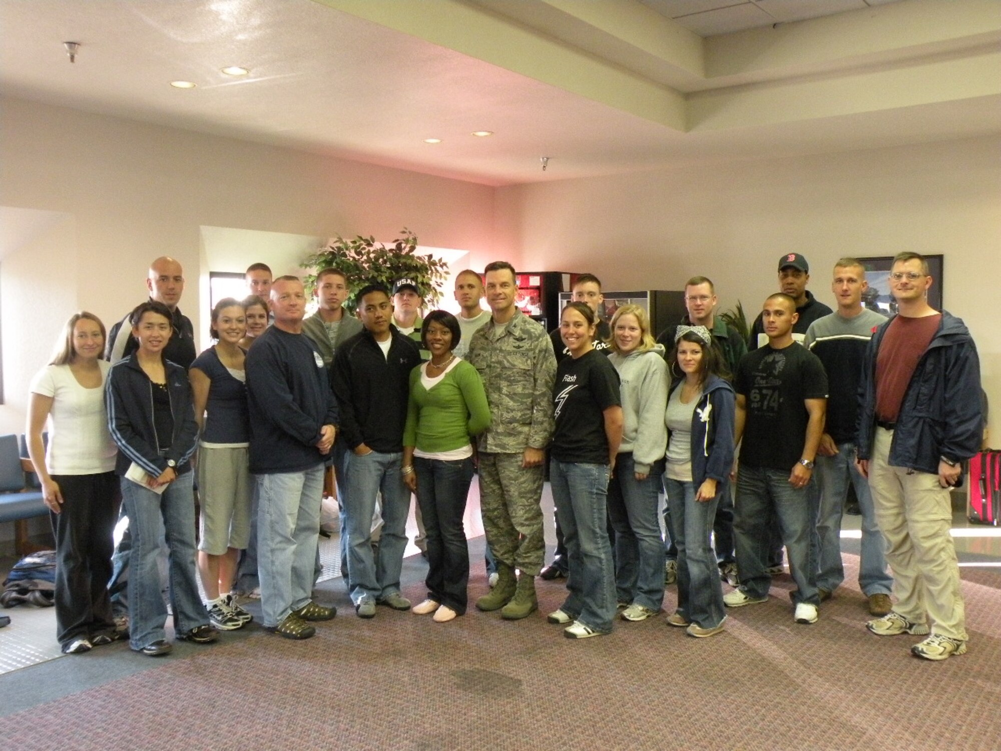 Airmen from Team Monterey at Base Operations, Travis Air Force Base, Calif. with Col. Mark Dillon, 60th Air Mobility Wing commander, prior to the flight to Ohio for the Air Force Marathon. (U.S. Air Force photo by Master Sgt. Cunard Smith)