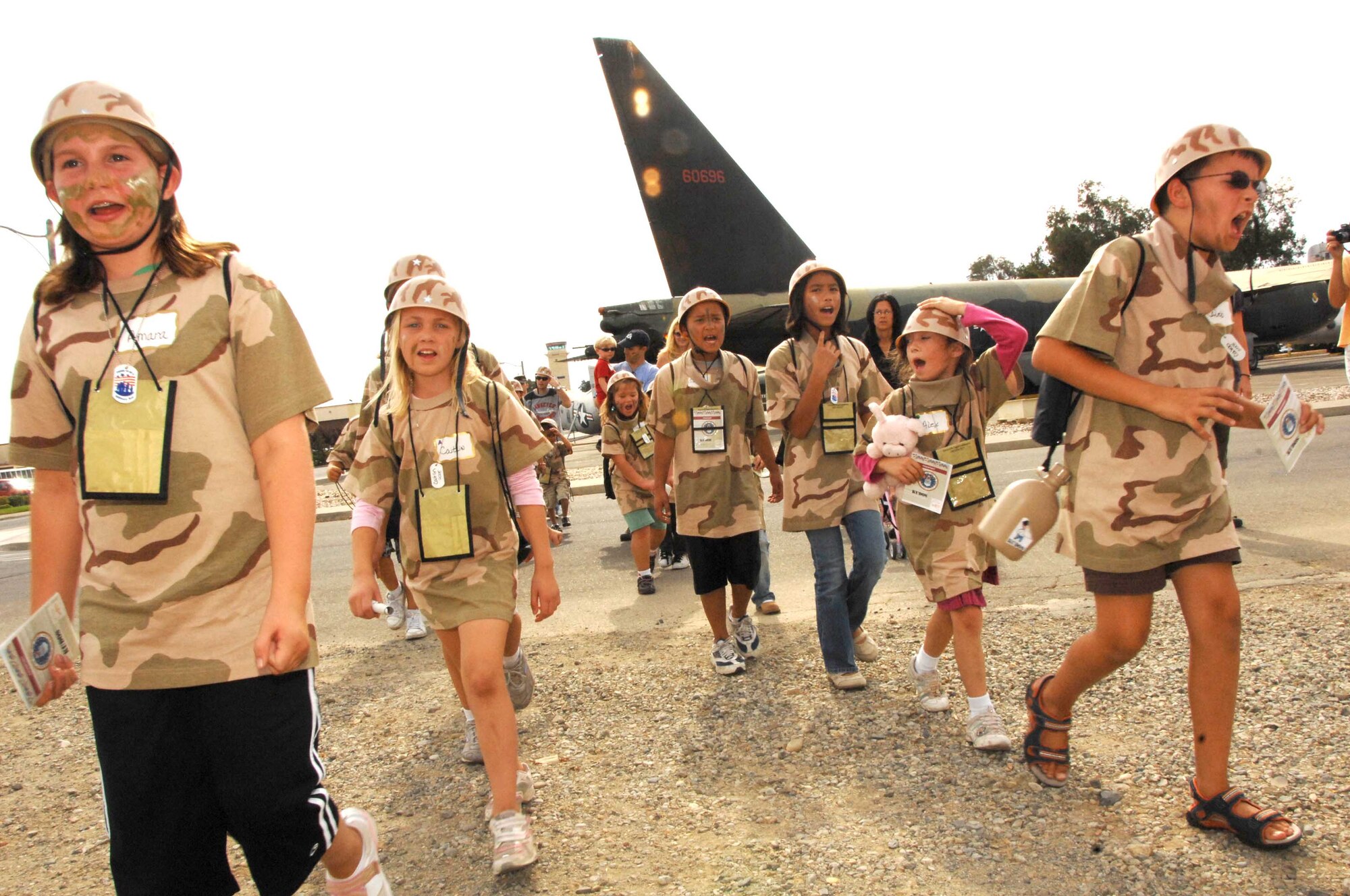 Children practice marching during the Kids Understanding Deployment Operations event Oct. 1.  (USAF photo/Amanda Lopez)

