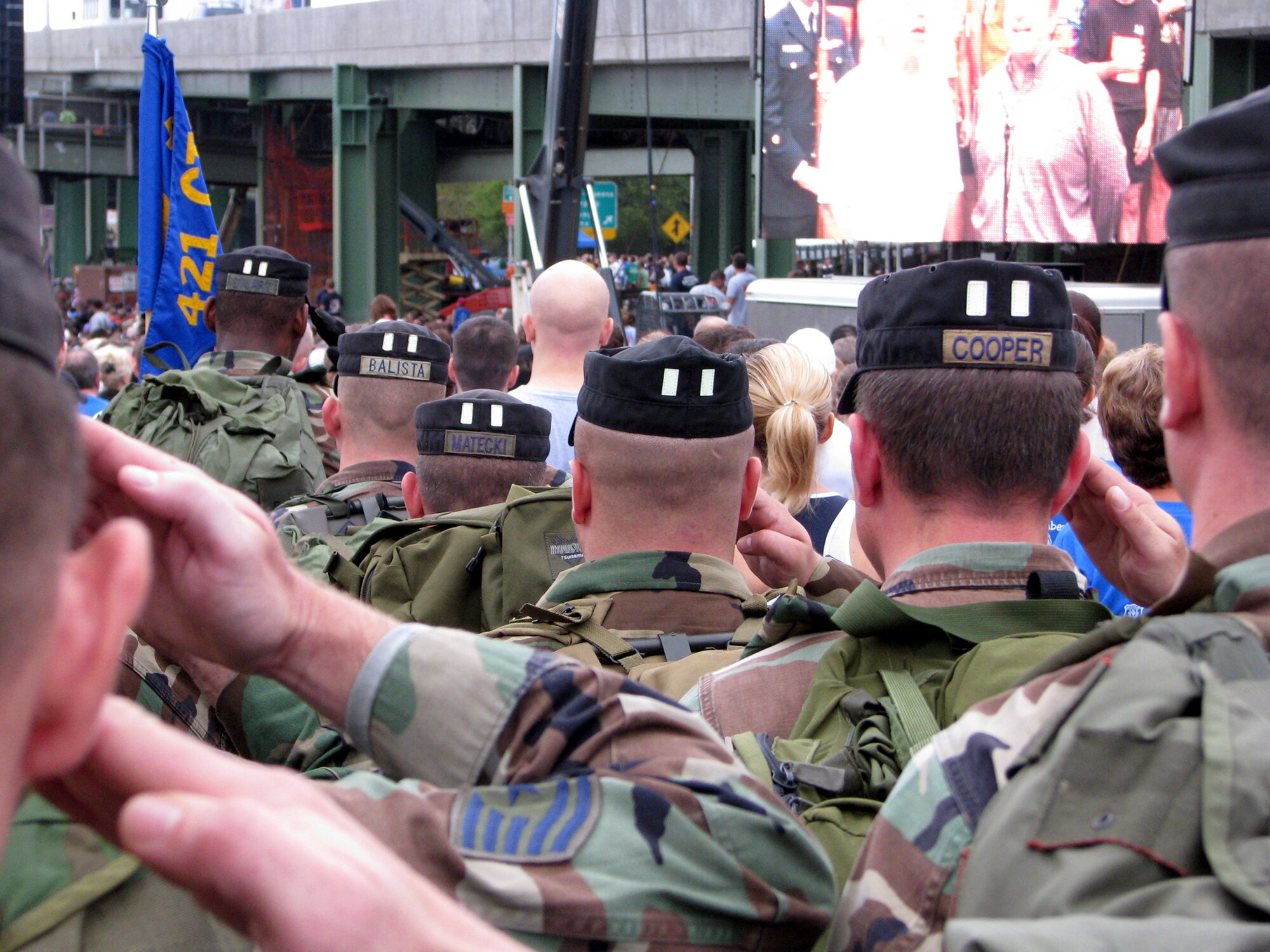 A formation of cadre from the 421st Combat Training Squadron from the U.S. Air Force Expeditionary Center, Fort Dix, N.J. render their salute during the singing of the National Anthem prior to the start of the Tunnel to Towers 5-kilometer Run/Walk in New York City Sept. 28, 2008. The Tunnel to Towers is a fundraiser in tribute to Stephen Siller, a New York City firefighter who gave his life on Sept. 11, 2001.  Siller ran from his vehicle in full firefighter gear from the Brooklyn Battery Tunnel to the World Trade Center when he heard of the disaster over his scanner. Siller had just come off duty and was headed for a round of golf. (U.S. Air Force Photo/Staff Sgt. Paul R. Evans)