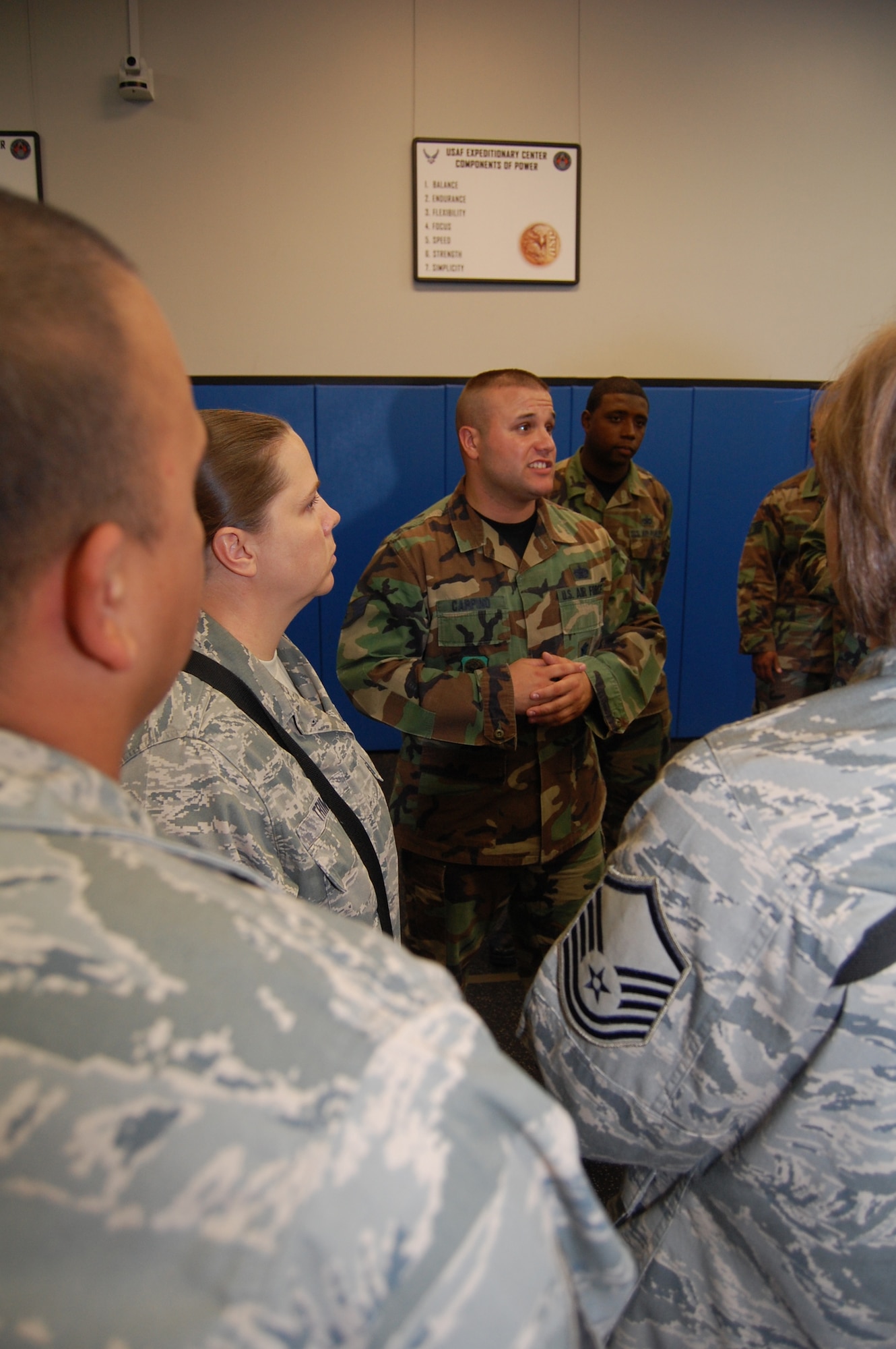 Staff Sgt. Tommy Carpino, security forces instructor from the U.S. Air Force Expeditionary Center's 421st Combat Training Squadron, teaches students in the Air Force Phoenix Warrior Training Course close quarters combat tactics during a class session in the center Sept. 22, 2008, on Fort Dix, N.J.  Phoenix Warrior is a security forces functional pre-deployment training course focusing on tactics, techniques and procedures unique to the deployed environment.  (U.S. Air Force Photo/Tech. Sgt. Scott T. Sturkol)
