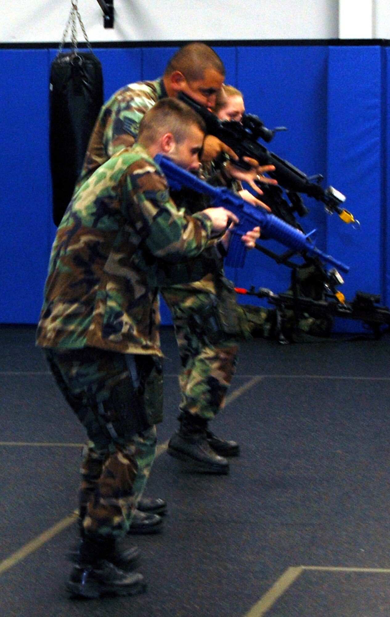 Students in the Air Force Phoenix Warrior Training Course learn close quarters combat tactics during a class session in the U.S. Air Force Expeditionary Center Sept. 22, 2008, on Fort Dix, N.J.  Phoenix Warrior, taught by the center's 421st Combat Training Squadron, is a security forces functional pre-deployment training course focusing on tactics, techniques and procedures unique to the deployed environment.  (U.S. Air Force Photo/Tech. Sgt. Scott T. Sturkol)