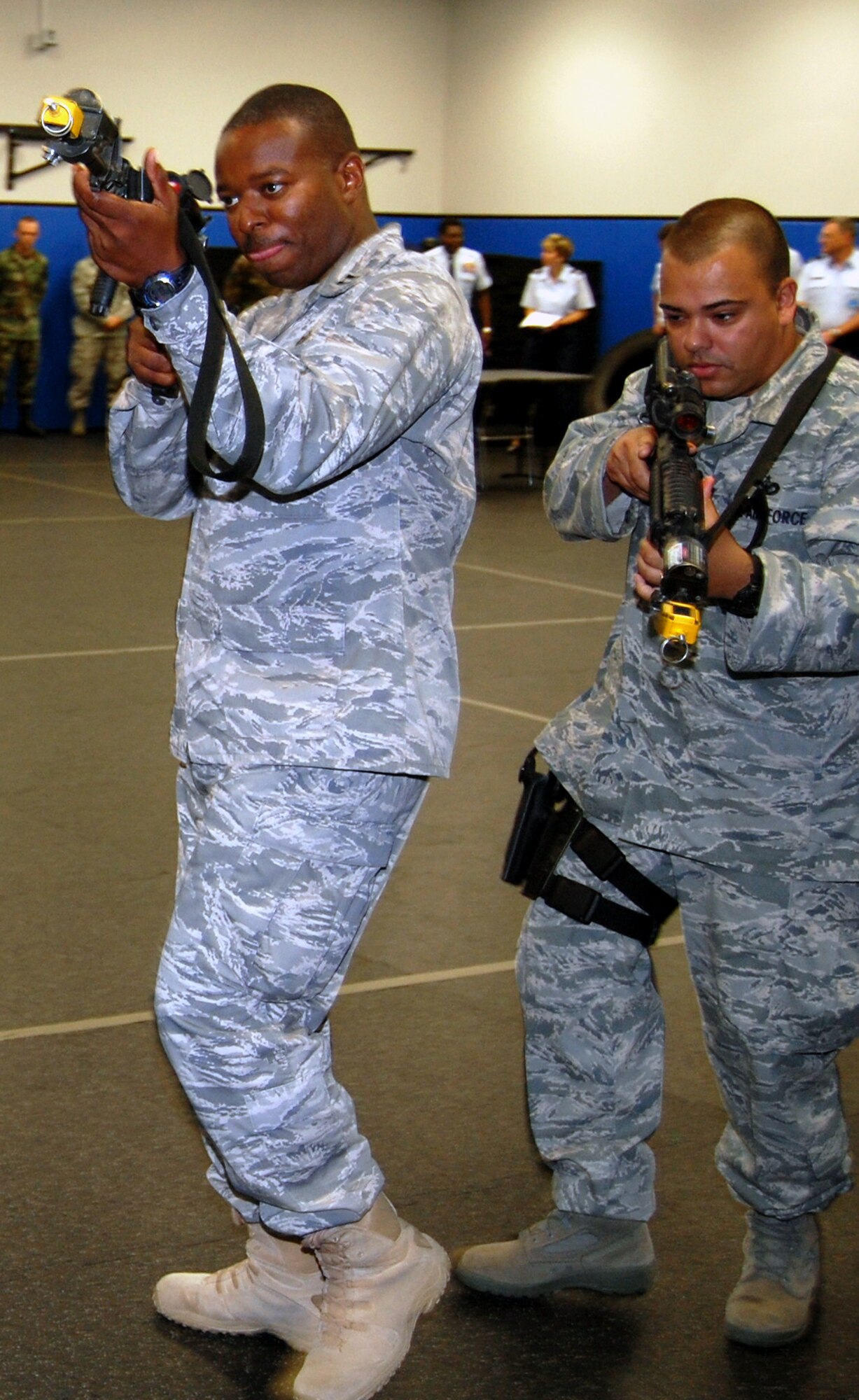 Students in the Air Force Phoenix Warrior Training Course learn close quarters combat tactics during a class session in the U.S. Air Force Expeditionary Center Sept. 22, 2008, on Fort Dix, N.J.  Phoenix Warrior, taught by the center's 421st Combat Training Squadron, is a security forces functional pre-deployment training course focusing on tactics, techniques and procedures unique to the deployed environment.  (U.S. Air Force Photo/Tech. Sgt. Scott T. Sturkol)