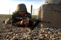 MINOT AIR FORCE BASE, N.D. -- Tech. Sgt. Duke McDuffie, 91st Missile Security Forces Squadron, guards a missile silo during a recapture exercise at a Launch Facility here Sept. 25. The exercise was conducted to test the 91st Security Forces Group’s ability to respond to the invasion of controlled areas. (U.S. Air Force photo by Senior Airman Stacy Moless)