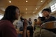 YOKOTA AIR BASE, Japan -- Staff Sgt. Felita Rowe from the Pacific Forces Band, sings to Gota Hosobuchi, a sixth grader from the Fourth Elementary school in Fussa, Japan, during a visit to his school Sept. 30. The elementary school invited approximately 30 military members from Yokota to come and take part in events that they learn throughout their school day.(U.S. Air Force photo by Senior Airman Laszlo Babocsi)(Released)