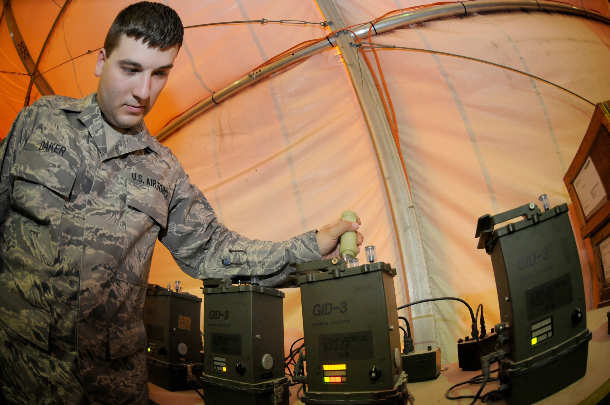 Airman 1st Class James Baker, emergency management journeyman assigned to the 379th Expeditionary Civil Engineer Squadron, uses a stimulant to do an operational check on M-22 chemical detectors Oct. 1, 2008, at an undisclosed air base in Southwest Asia. Emergency management members ensure equipment and personnel are prepared should the enemy choose to resort to chemical weapons use. Airman Baker, a native of Stafford, Va., is deployed from Yokota Air Base, Japan, in support of Operations Iraqi and Enduring Freedom and Joint Task Force-Horn of Africa. (U.S. Air Force photo by Staff Sgt. Darnell T. Cannady/Released)