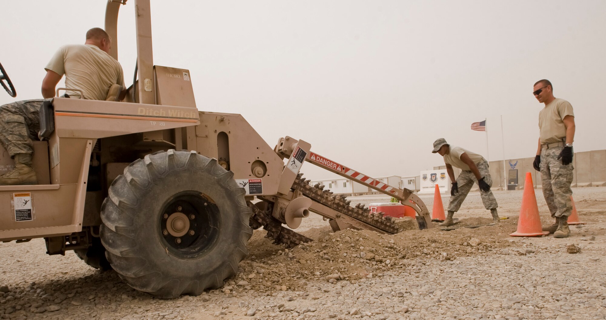 ALI BASE, Iraq -- In attempt to return the base to the Iraqi military in better condition when leaving, the 407th Expeditionary Civil Engineer Squadron Utilities Shop Airmen dig trenches for water and sewer lines Oct. 1, 2008.(U.S. Air 
Force photo/Airman 1st Class Christopher Griffin)