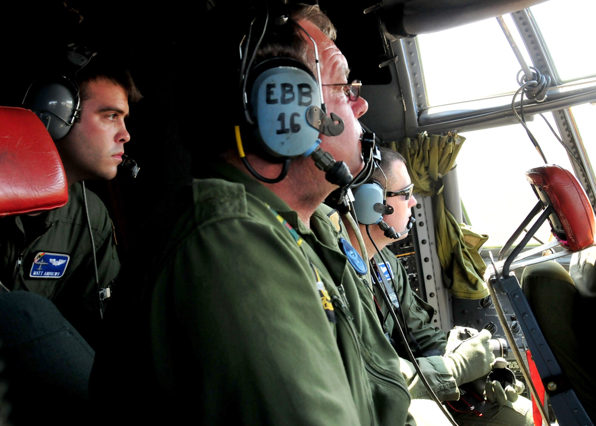 United States Air Force Capt. Matt Andrews (left), 37th Airlift Squadron C-130 pilot, and Lt. Col. Mark August (right), 37th AS commander, both from Ramstein Air Base, Germany, check out the cockpit of a South African C-130 during a familiarization flight, Sept. 22, 2008. (U.S. Air Force photo by Staff Sgt. Markus Maier)(Release)