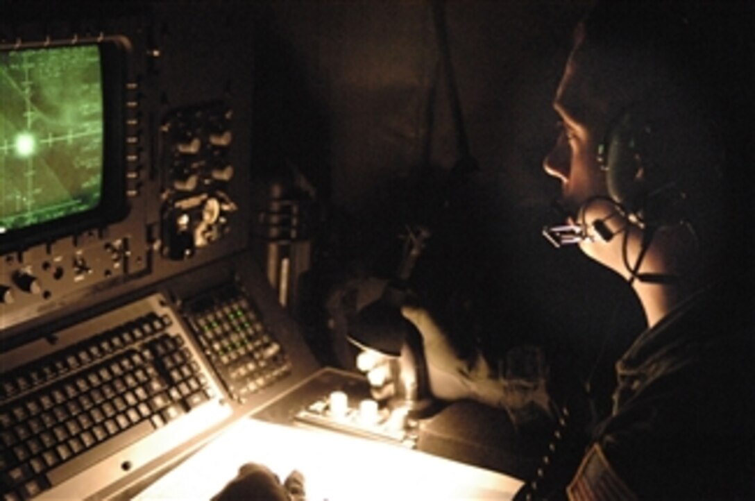 U.S. Air Force Airman 1st Class Chad Bryson, a sensor operator student in the 19th Special Operations Squadron, searches for predetermined practice targets at Hurlburt Field, Fla., on Sept. 22, 2008.  